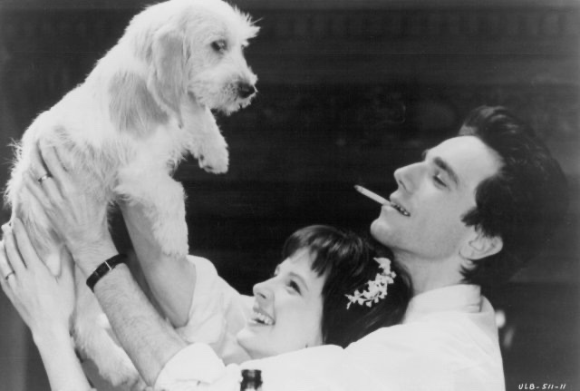 Tomas and Teresa playing with their dog, example of love, from The Unbearable Lightness of Being.